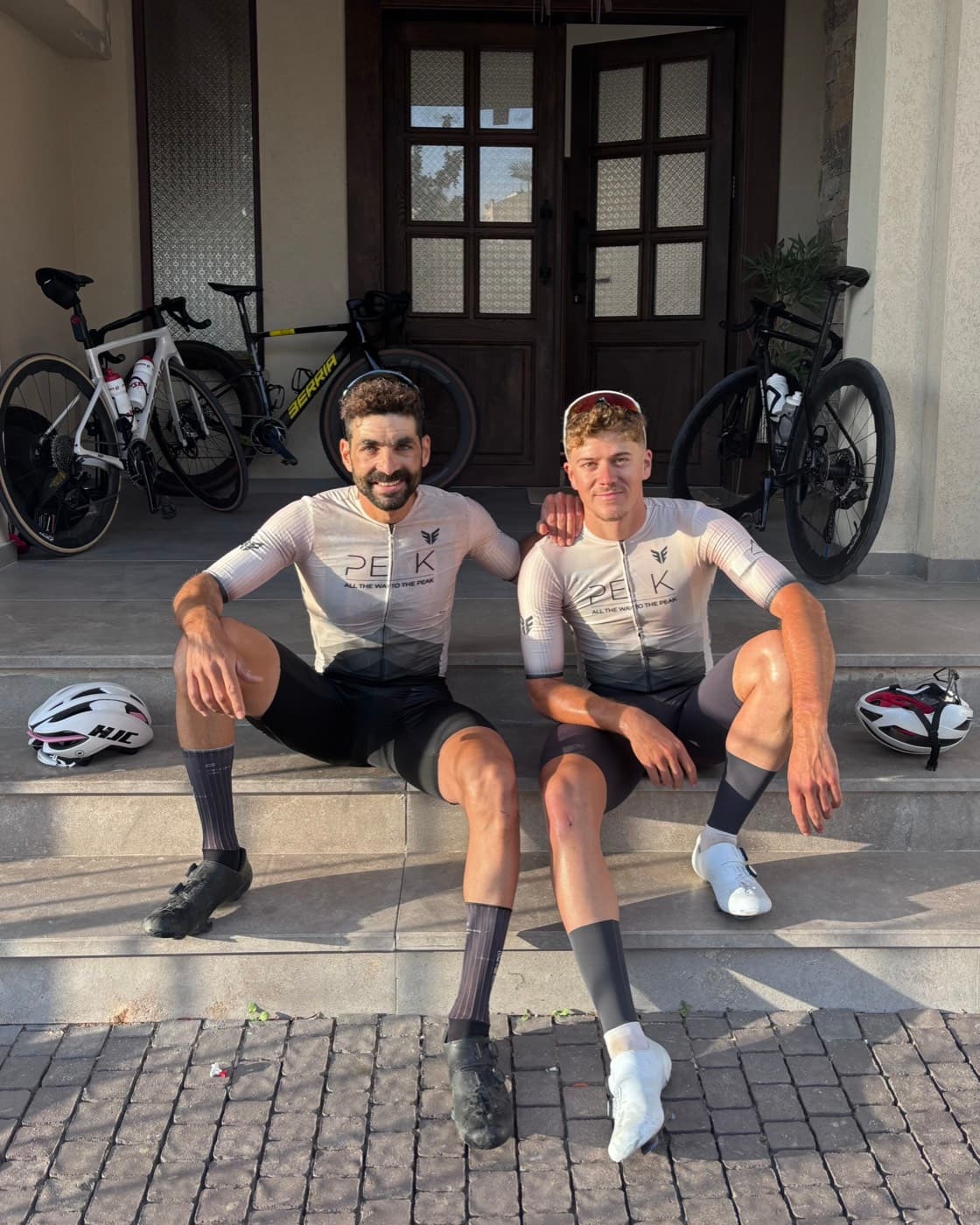 Tomer Caspi with a Peak Riders teammate in team kit